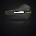Ergonomic hollow bike saddle with memory foam on premium dark studio background